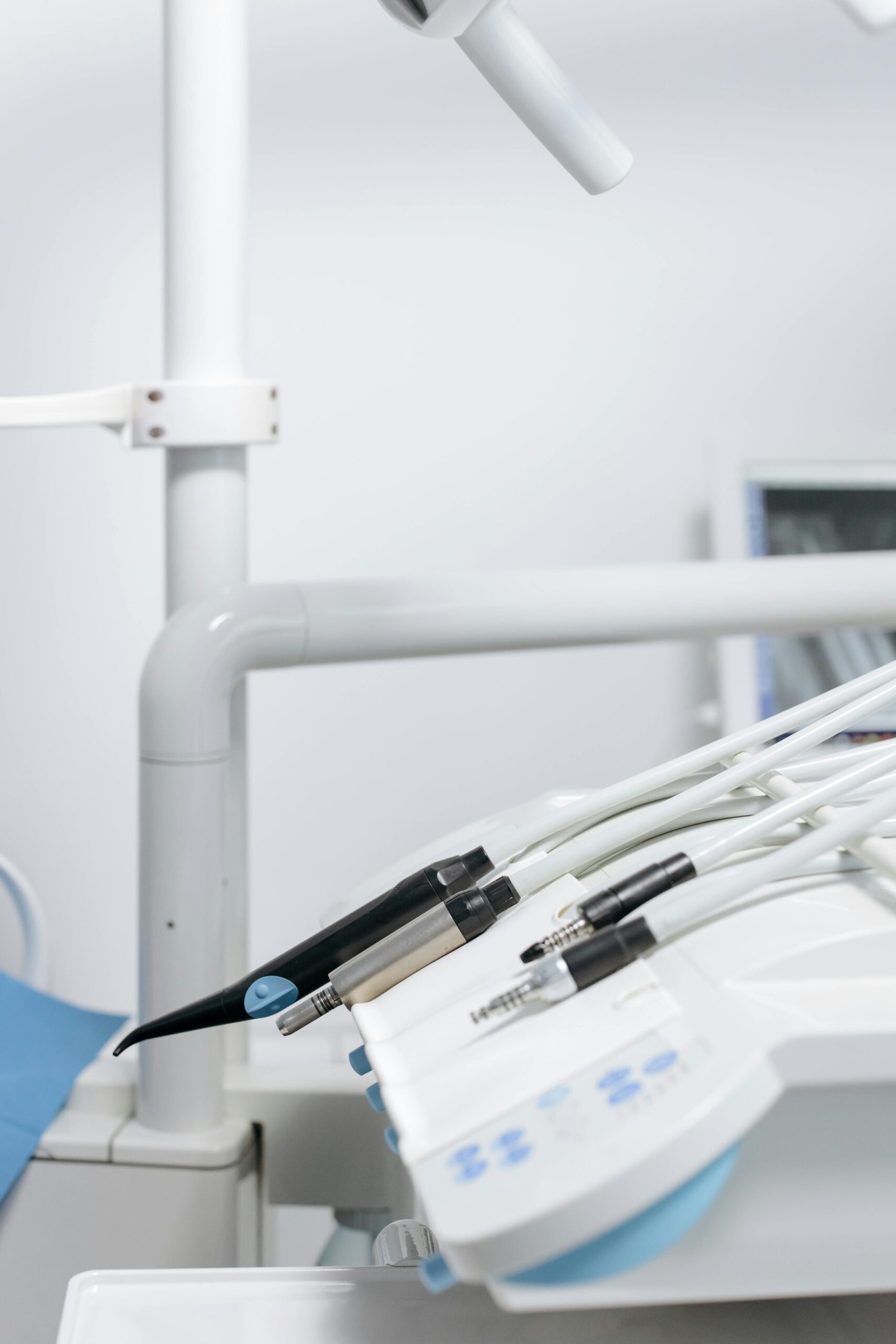 Sterile dental equipment and tools in a modern clinic setting, ready for dental care procedures.